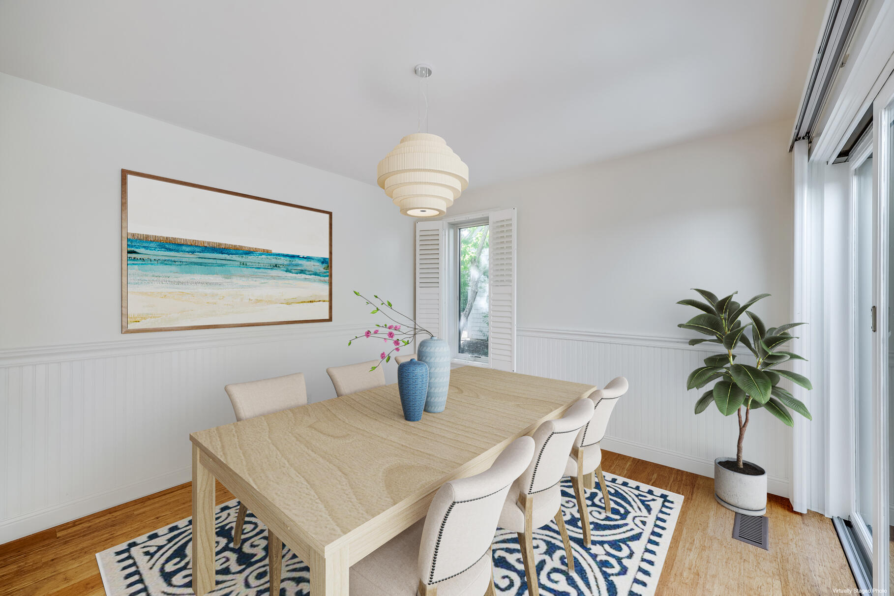 68 Mid-Iron Way, Unit 7545 Mashpee, MA 02649 - Photo 8 of 43 a view of a dining room with furniture and wooden floor