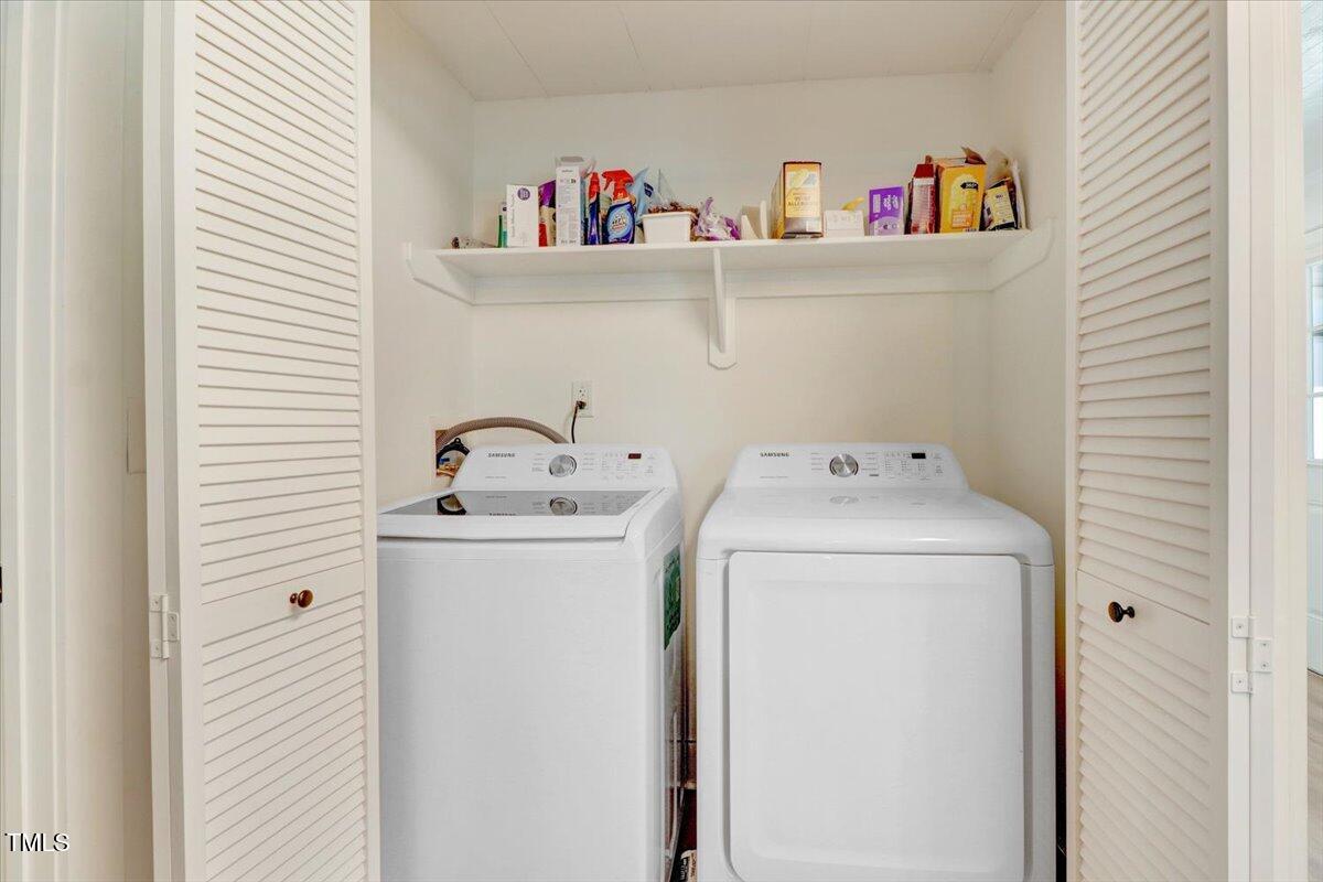 175 Debro Road Kenly, NC 27542 - Photo 23 of 30 a utility room with dryer and washer