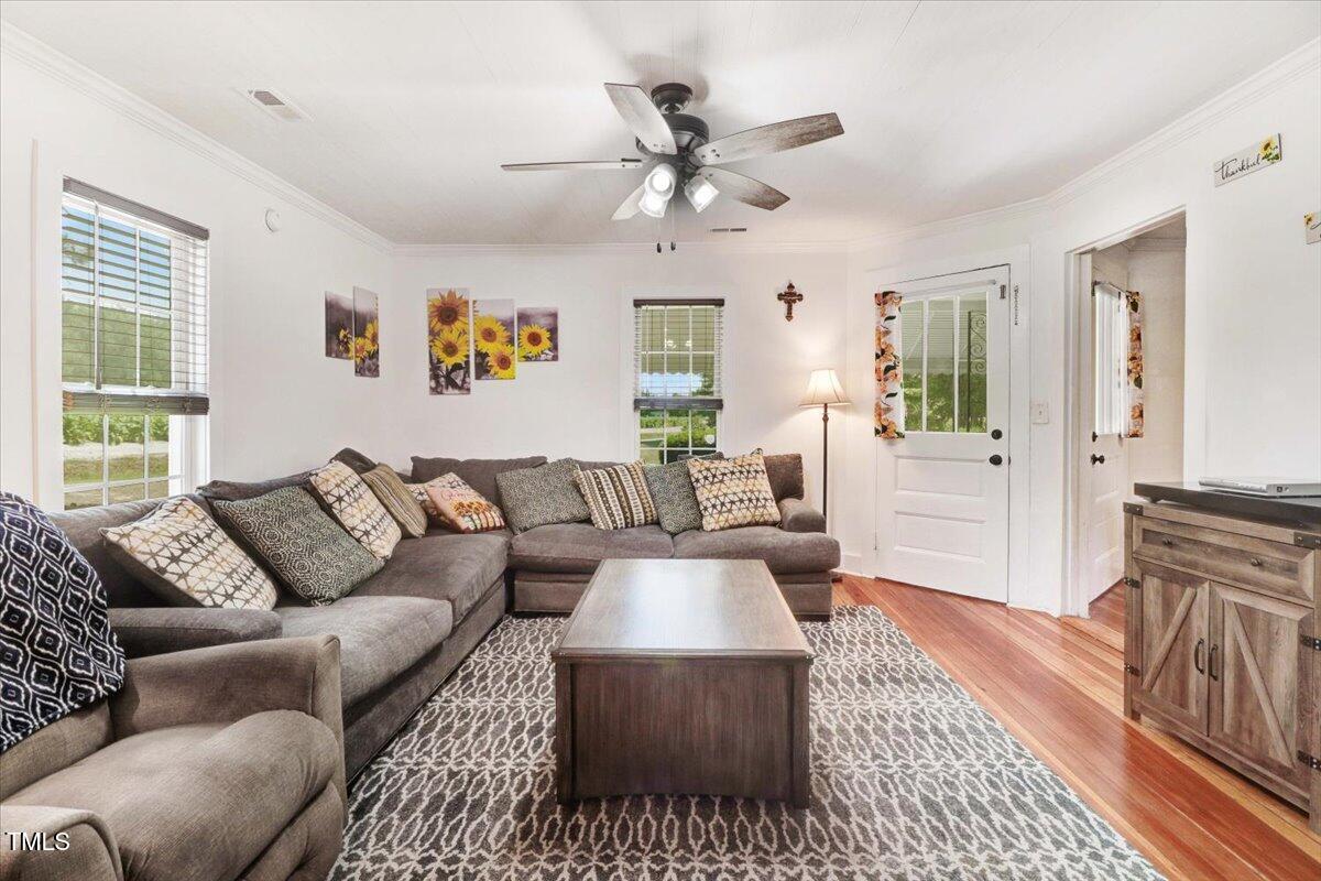 175 Debro Road Kenly, NC 27542 - Photo 6 of 30 a living room with furniture and a rug