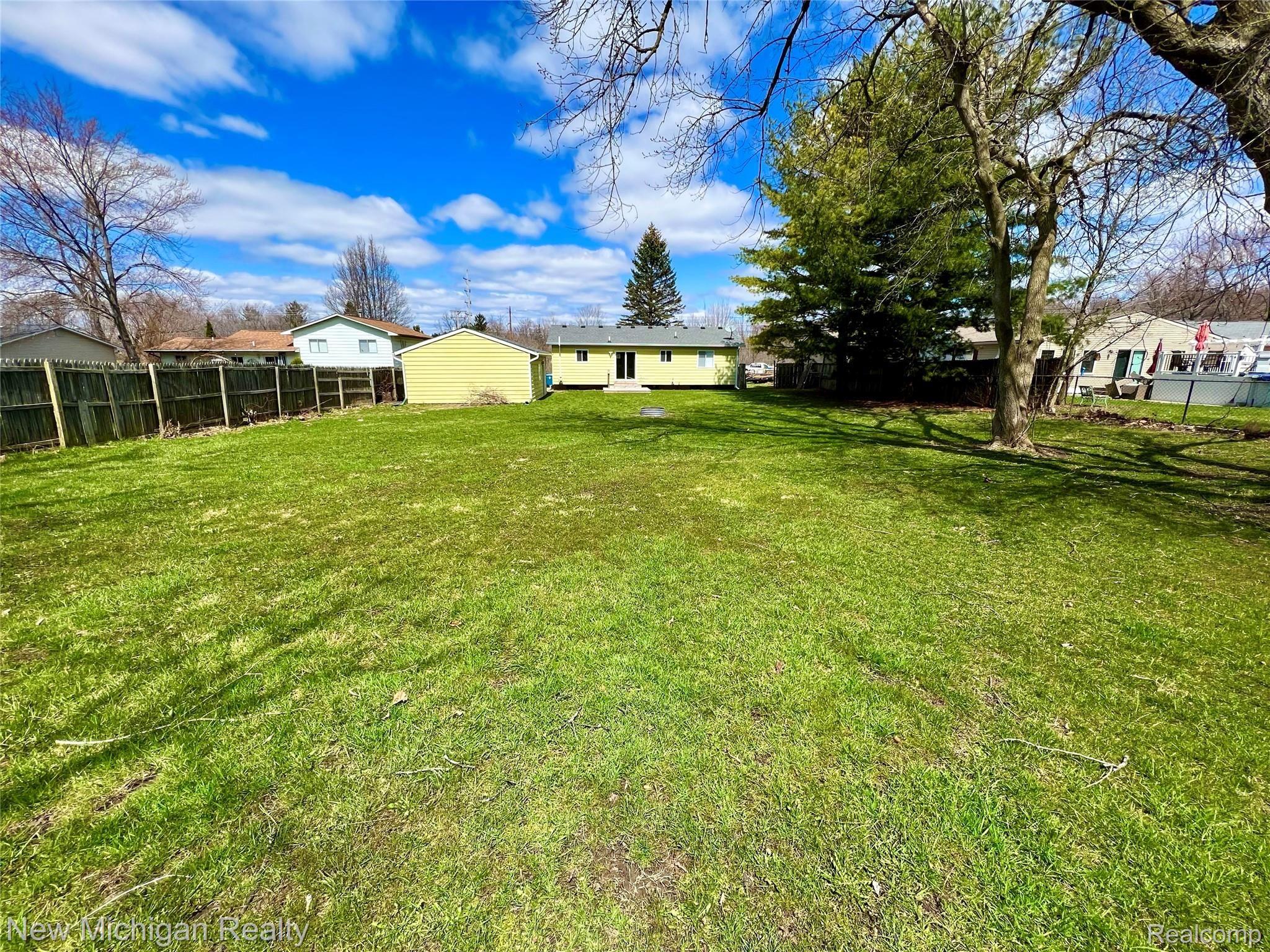 2365 West Thompson Road Fenton, MI 48430 - Photo 18 of 22 Back from backyard.jpeg