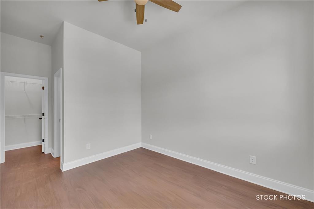 1038 Homestead Way Street Dacula, GA 30019 - Photo 23 of 36 a view of an empty room