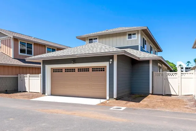 a view of a house with a garage