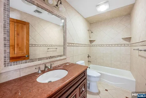 $1,395,000 | 309 South Drive, Paramus, NJ 07652