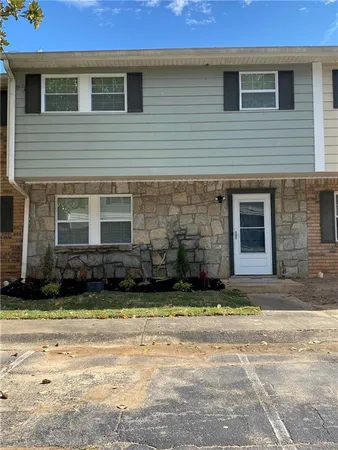 a view of a brick house with a window