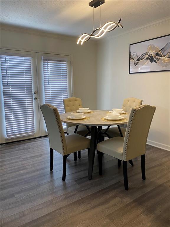 4701 Flat Shoals Road, Unit 54G Union City, GA 30291 - Photo 6 of 18 a view of a dining room with furniture and wooden floor
