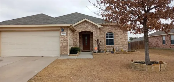 front view of a house with yard