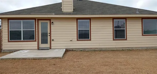 a view of entrance gate of the house