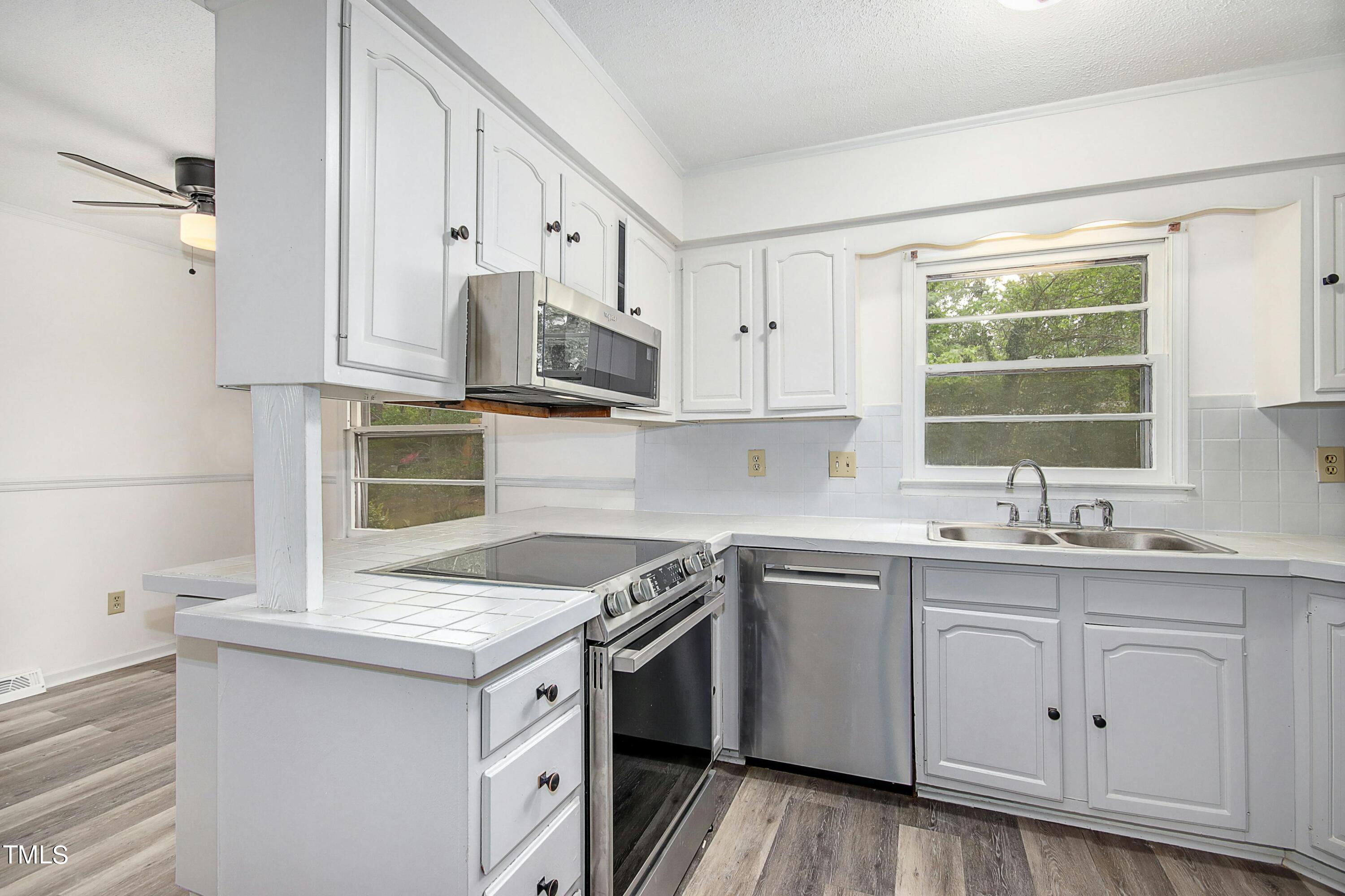 606 Rippling Stream Road Durham, NC 27704 - Photo 8 of 26 010-462134-IMG_2961_HDR