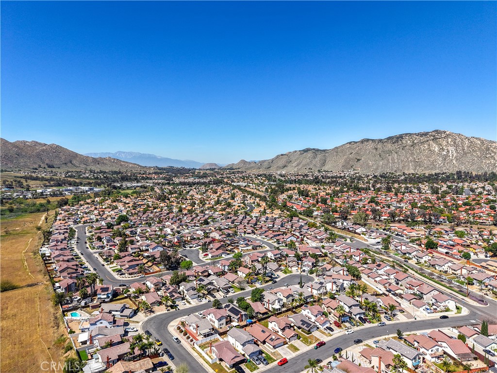 11369 Red Hill Road Moreno Valley, CA 92557 - Photo 39 of 41 an aerial view of residential houses with outdoor space