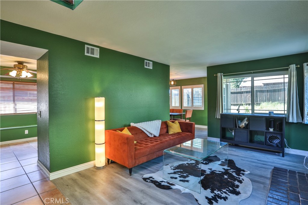 11369 Red Hill Road Moreno Valley, CA 92557 - Photo 4 of 41 a living room with furniture and a window