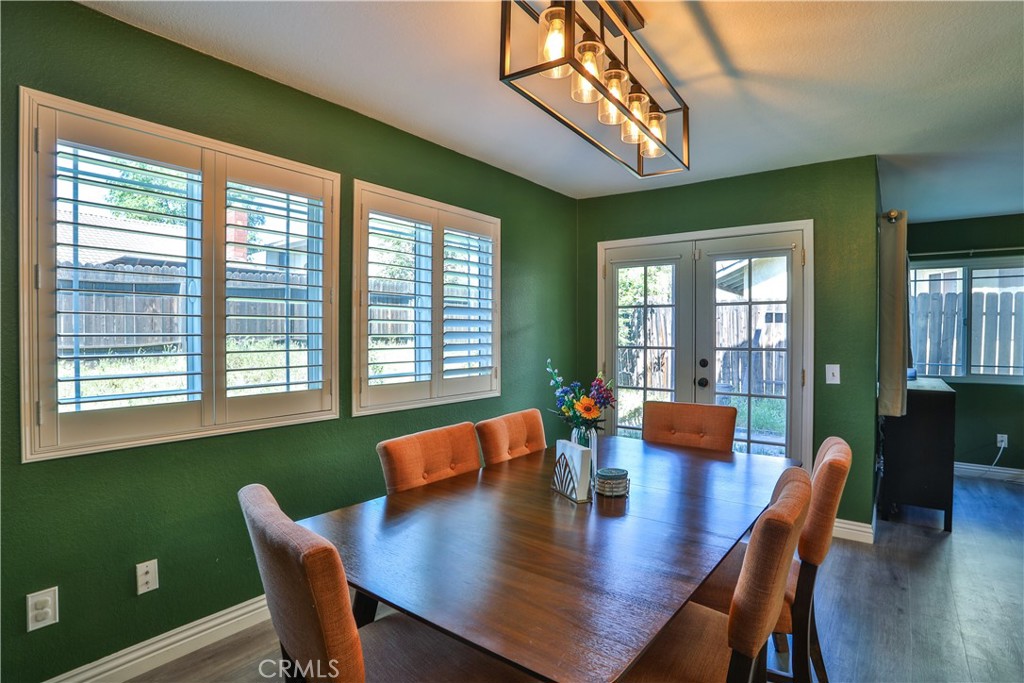 11369 Red Hill Road Moreno Valley, CA 92557 - Photo 8 of 41 a view of a dining room with furniture window and wooden floor