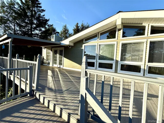 a view of a house with a large window