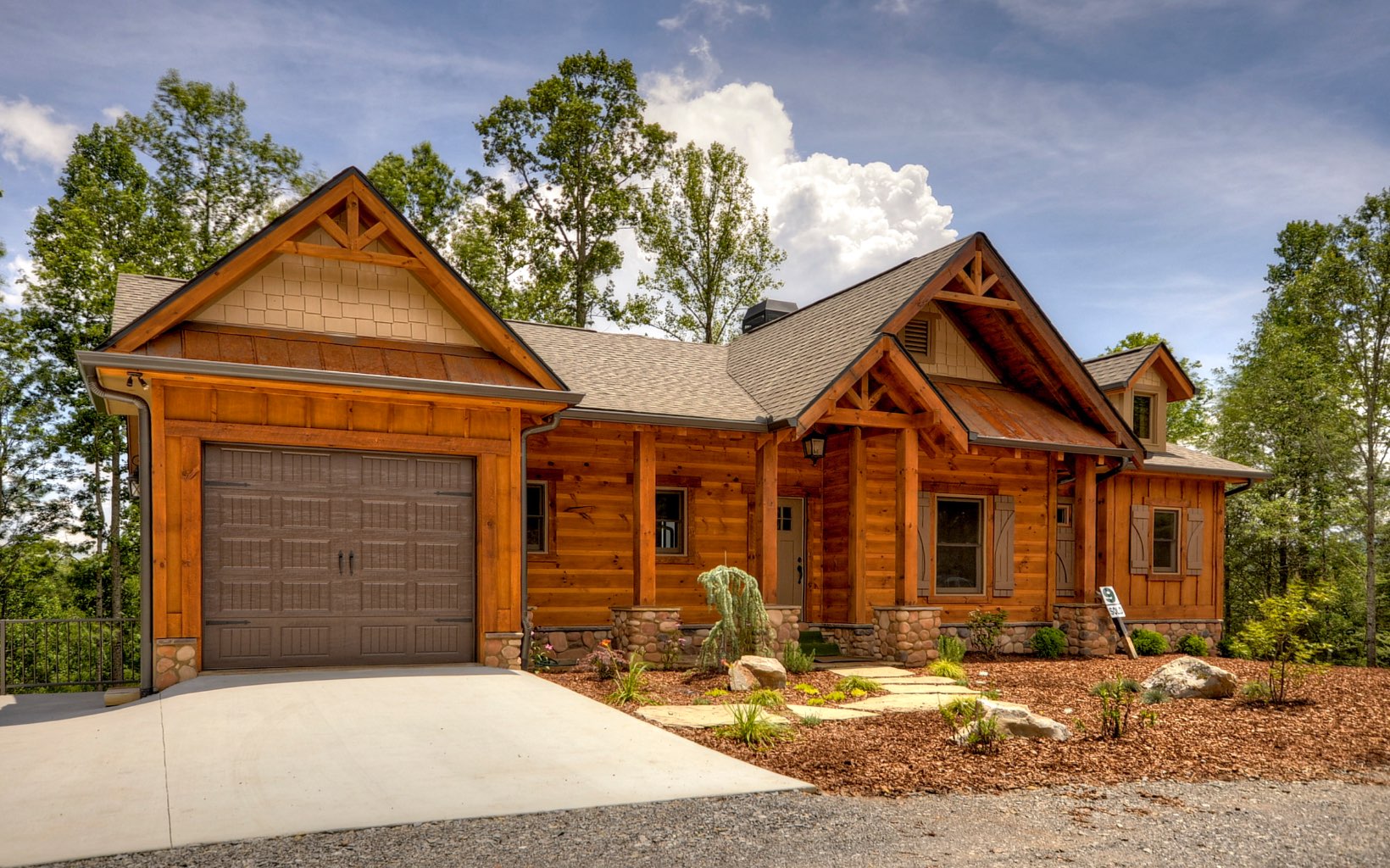 2 Overlook At Branch Blue Ridge, GA 30513 - Photo 1 of 1 a front view of a house with yard and garage