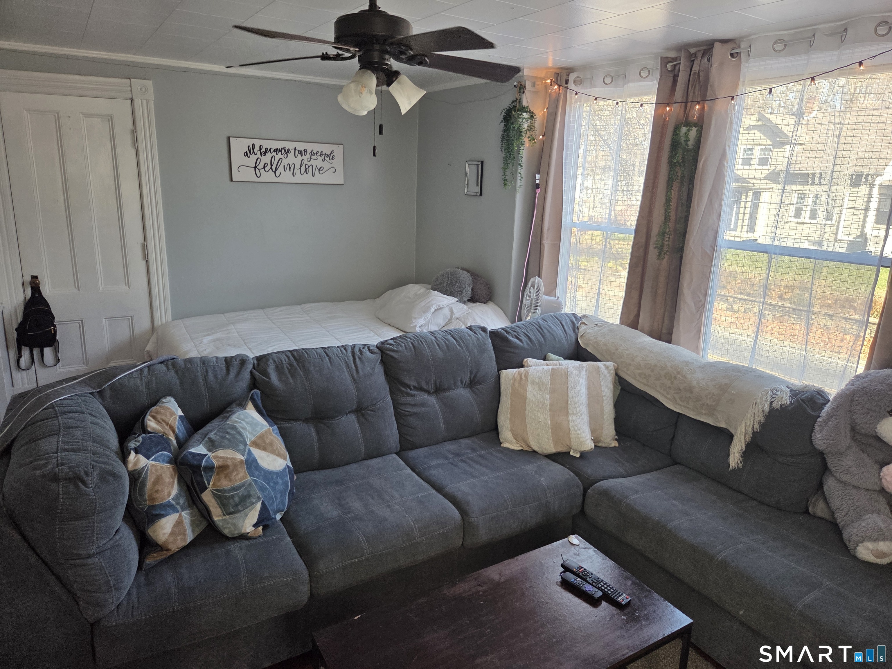 133 Maple Street Killingly, CT 06239 - Photo 6 of 12 a living room with furniture and a window