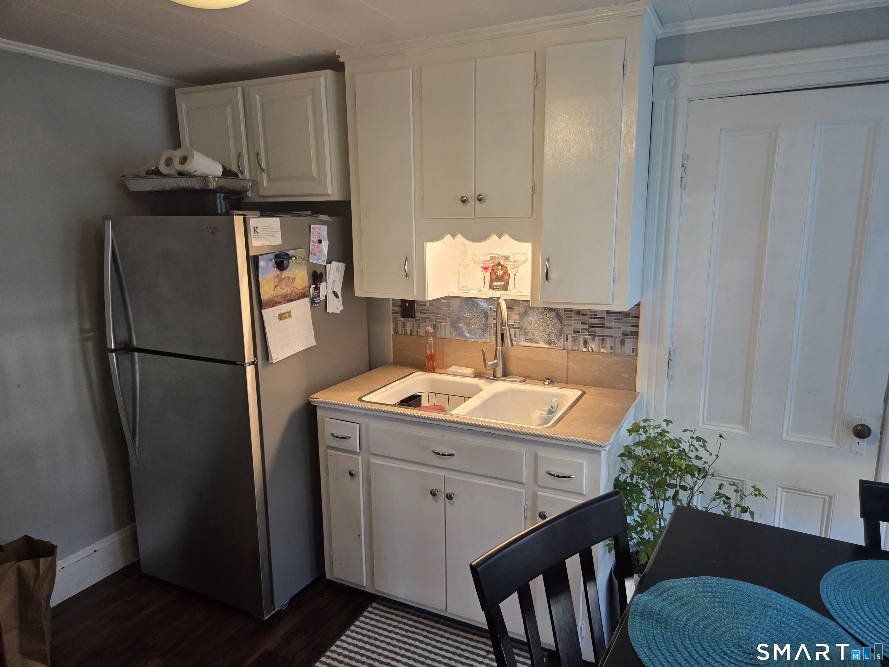 133 Maple Street Killingly, CT 06239 - Photo 10 of 12 a kitchen with a sink appliances and cabinets