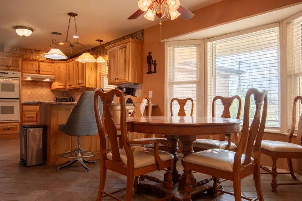 a room with furniture and a wooden floor