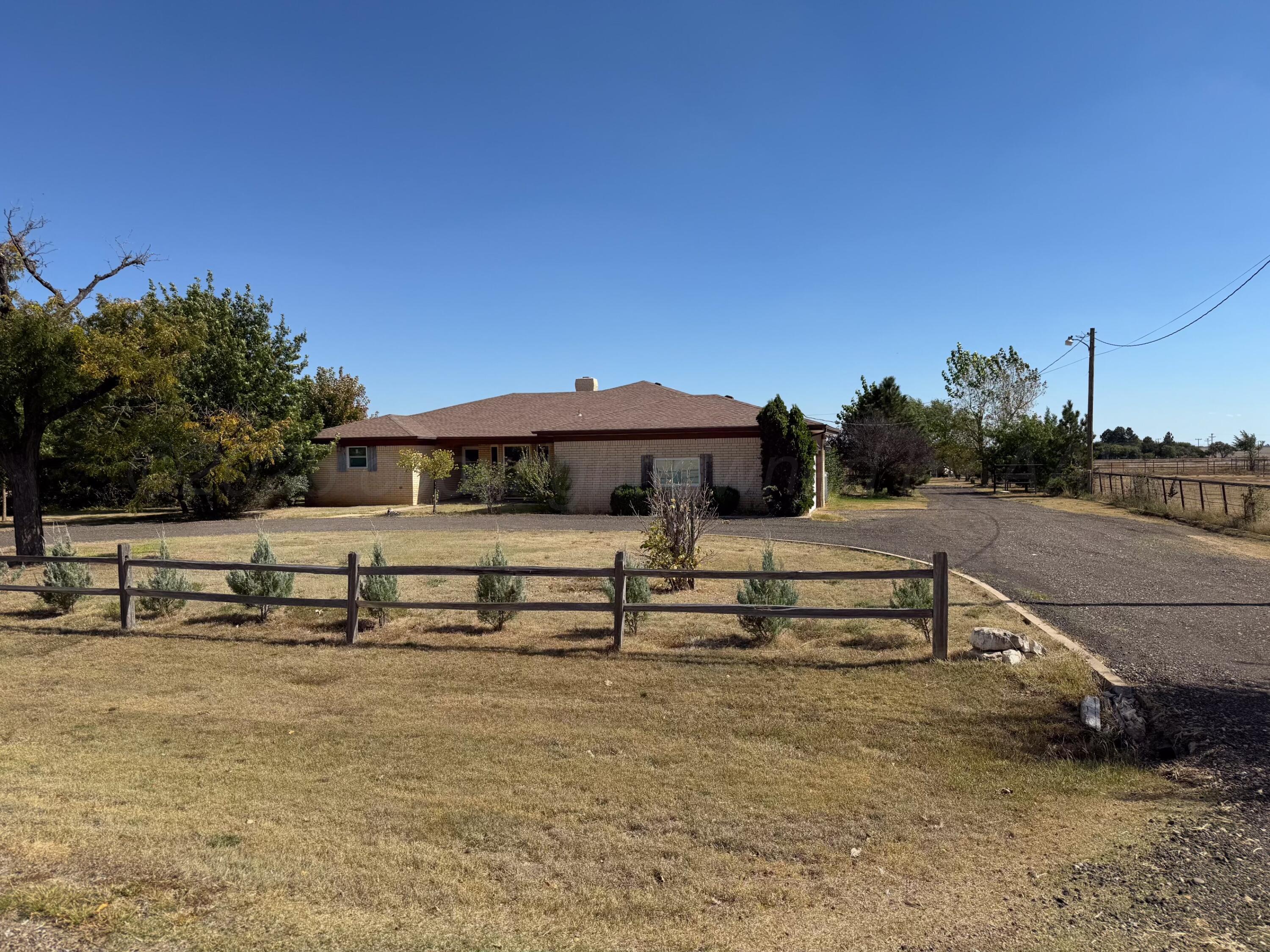 14653 Halsey Trail Amarillo, TX 79118 - Photo 4 of 66 a view of a yard with an outdoor seating