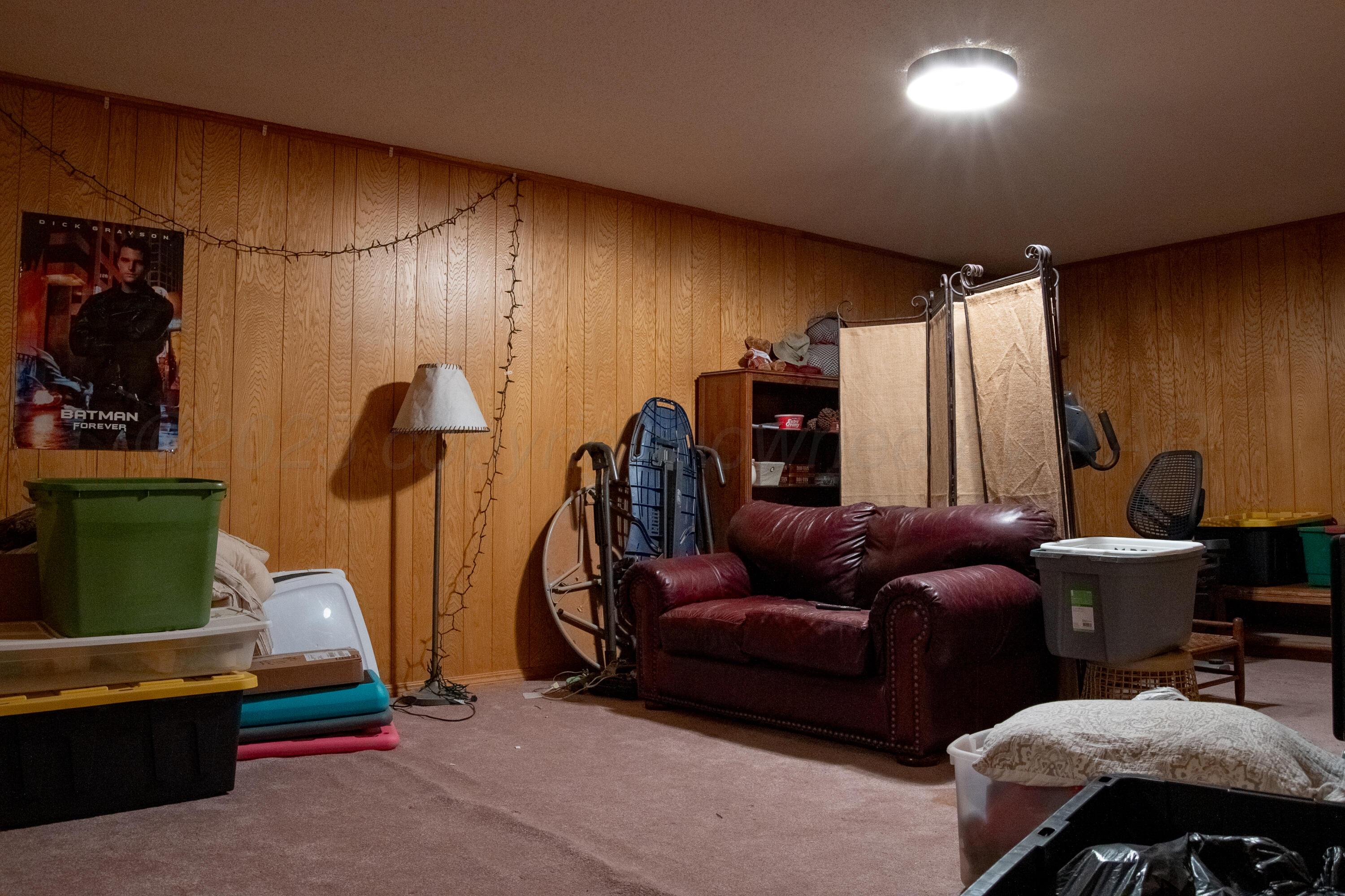 14653 Halsey Trail Amarillo, TX 79118 - Photo 49 of 66 a living room with furniture and a flat screen tv