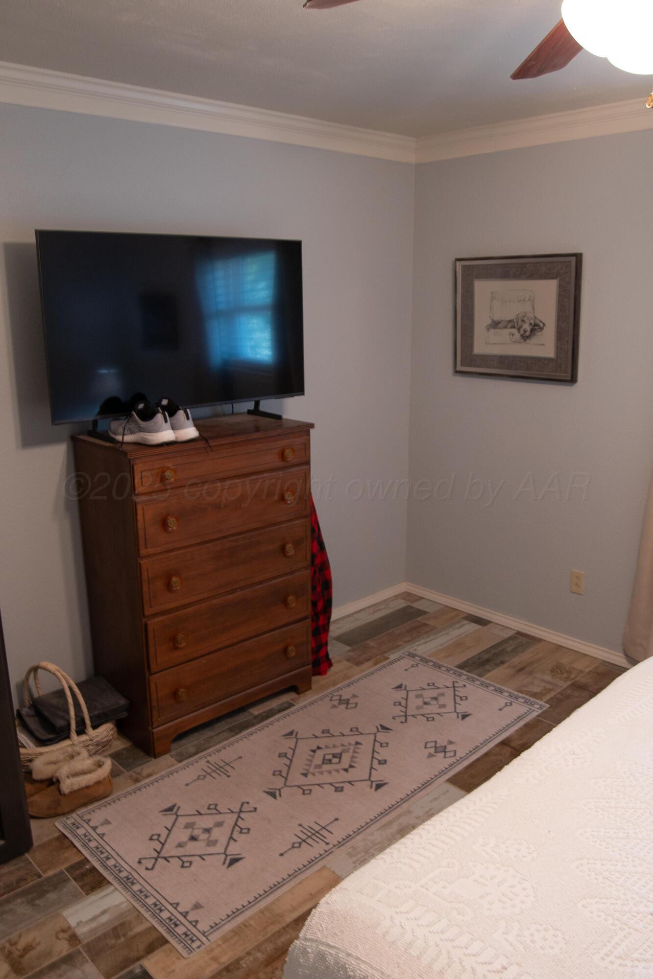 14653 Halsey Trail Amarillo, TX 79118 - Photo 52 of 66 a room with furniture and flat screen tv