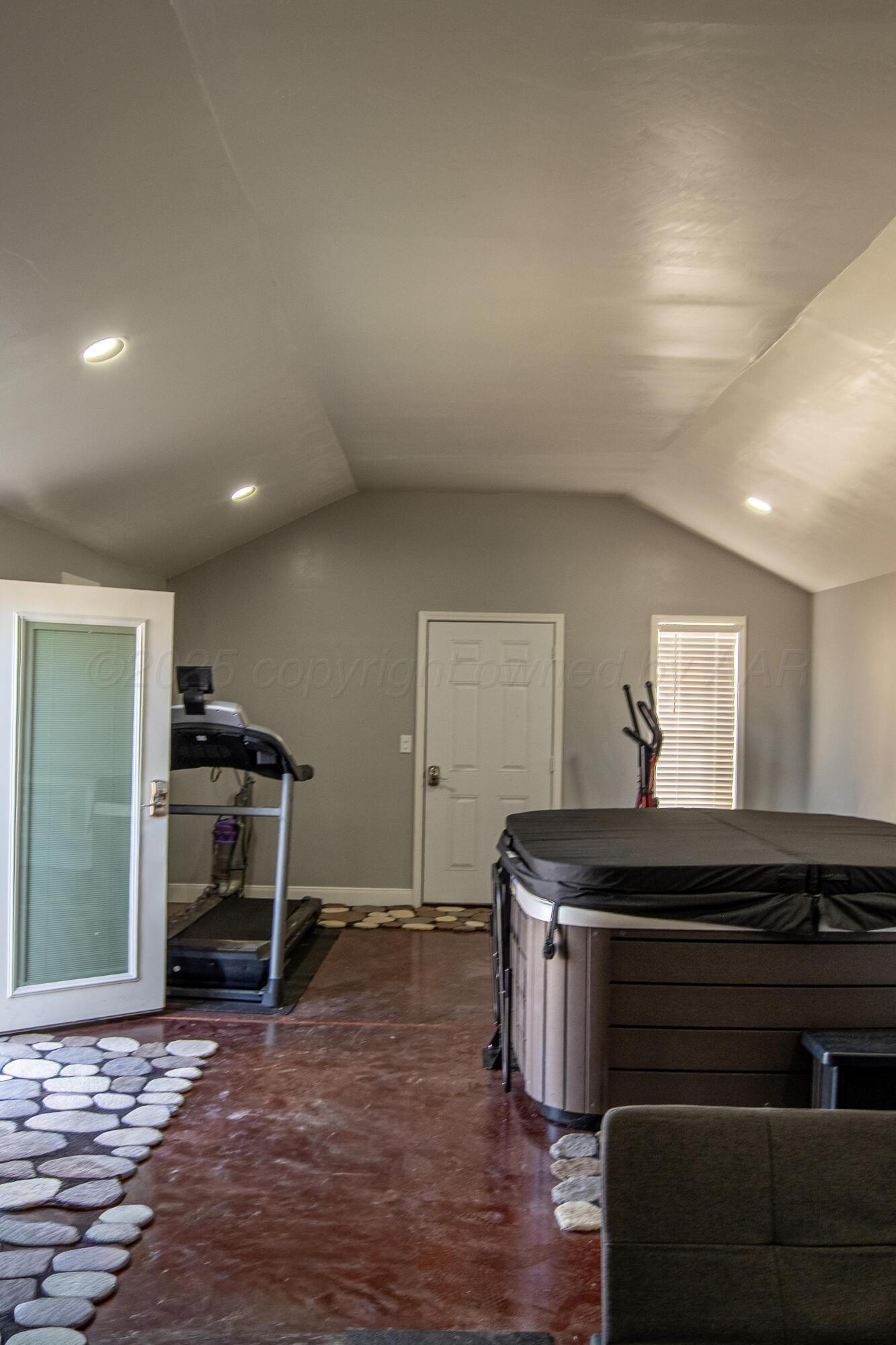 14653 Halsey Trail Amarillo, TX 79118 - Photo 65 of 66 a room with furniture and a wooden floor