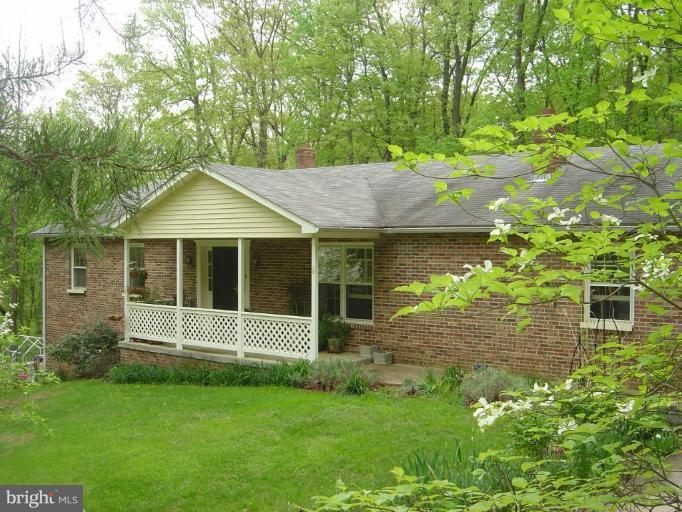 a view of a house with a garden