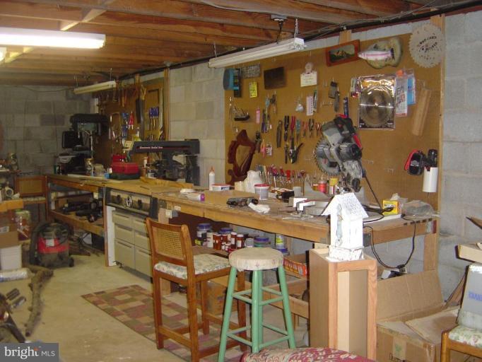 138 Windy Pines Road Front Royal, VA 22630 - Photo 15 of 17 a kitchen with a sink and cabinets