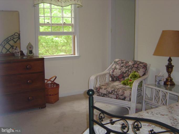 138 Windy Pines Road Front Royal, VA 22630 - Photo 4 of 17 a bed room with furniture and a window