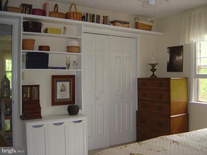 138 Windy Pines Road Front Royal, VA 22630 - Photo 7 of 17 a living room with furniture and a flat screen tv