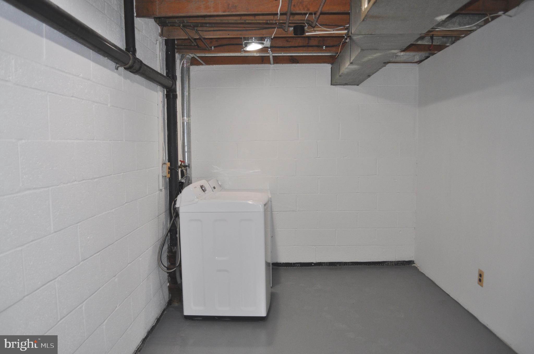 9110 Tumbleweed Run, Unit E Laurel, MD 20723 - Photo 23 of 39 Lower Level Laundry Area
