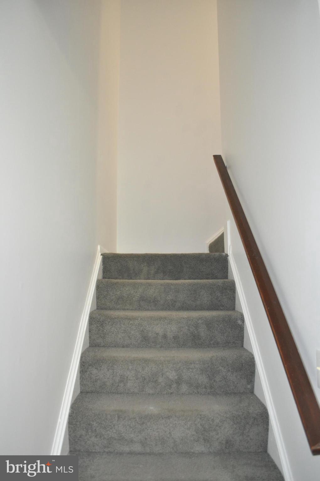 9110 Tumbleweed Run, Unit E Laurel, MD 20723 - Photo 25 of 39 Stairs to Upper Level