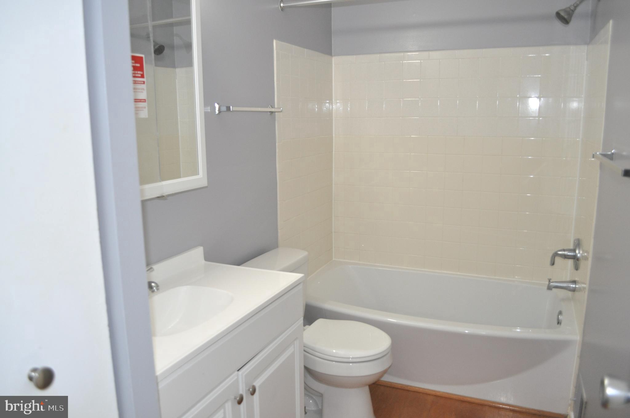 9110 Tumbleweed Run, Unit E Laurel, MD 20723 - Photo 27 of 39 Updated Upper Level Bathroom