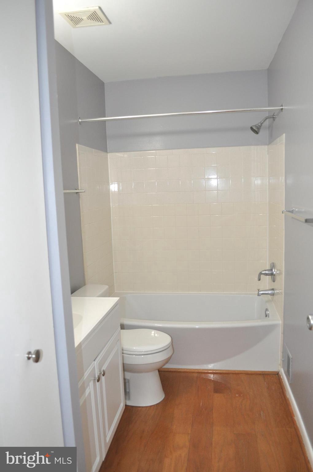 9110 Tumbleweed Run, Unit E Laurel, MD 20723 - Photo 28 of 39 Upper Level Bathroom with tub/shower combo