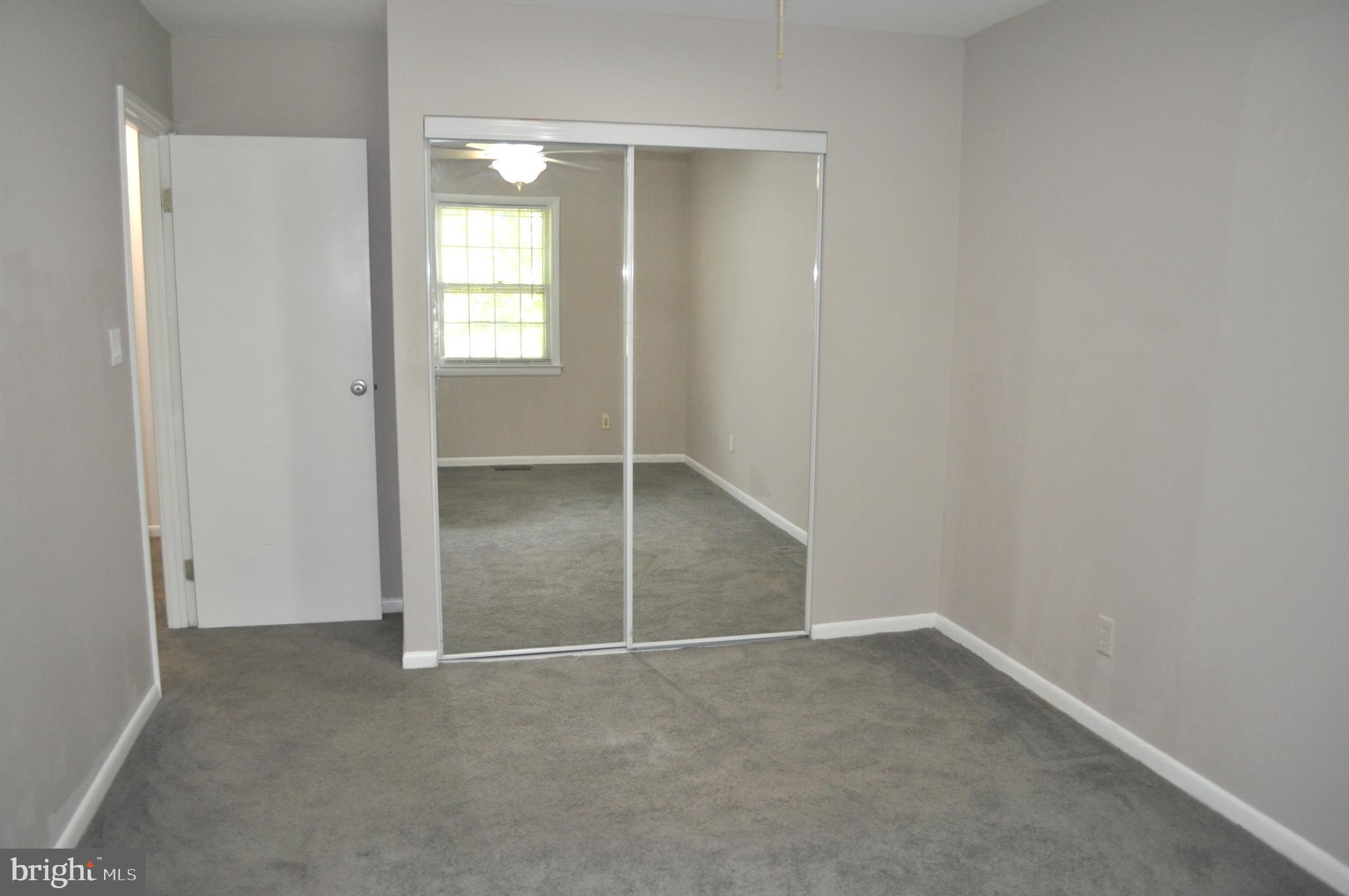 9110 Tumbleweed Run, Unit E Laurel, MD 20723 - Photo 31 of 39 Bedroom #1 with mirrored closet