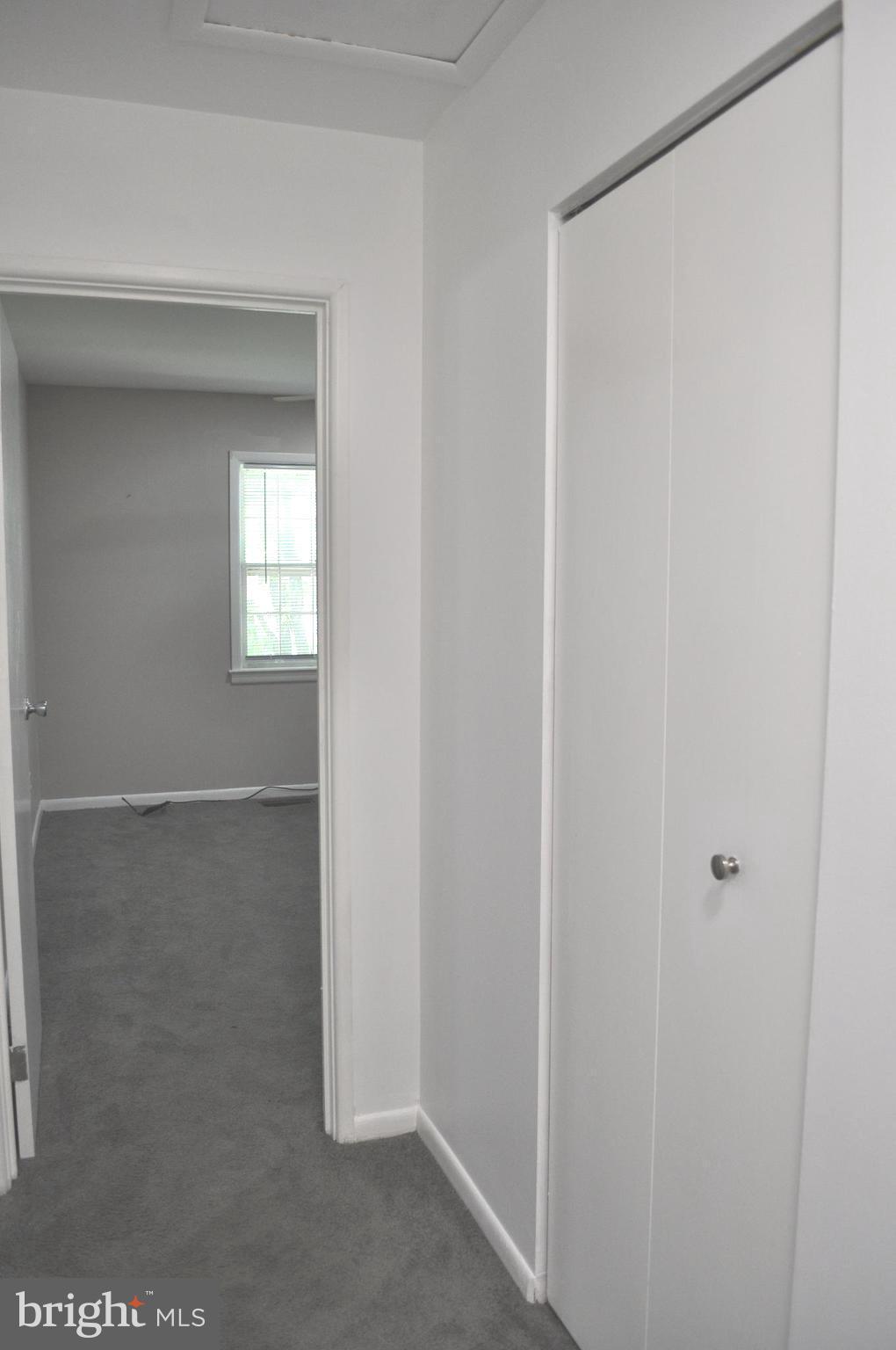 9110 Tumbleweed Run, Unit E Laurel, MD 20723 - Photo 34 of 39 Upper Level Hallway with storage closet