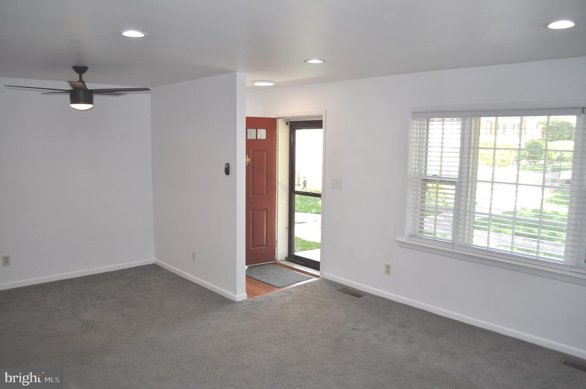 9110 Tumbleweed Run, Unit E Laurel, MD 20723 - Photo 5 of 39 Light and Bright Entry into Living Room