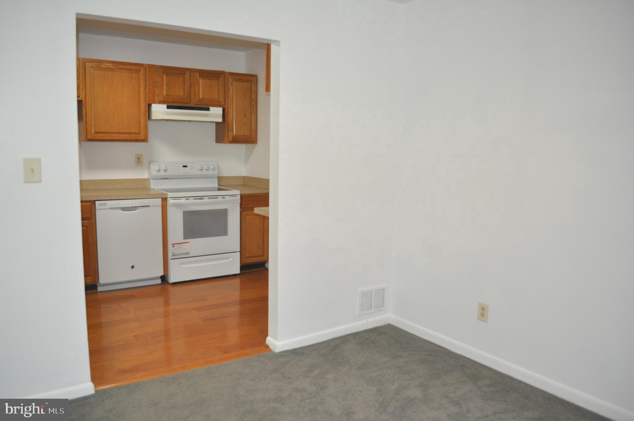 9110 Tumbleweed Run, Unit E Laurel, MD 20723 - Photo 10 of 39 Dining Room opens to Kitchen