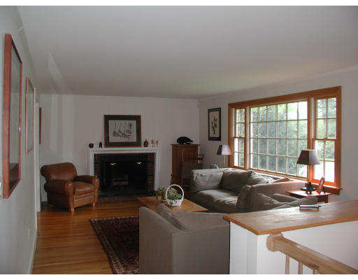 23 Roberts Road Wellesley, MA 02481 - Photo 4 of 7 a living room with furniture and a flat screen tv