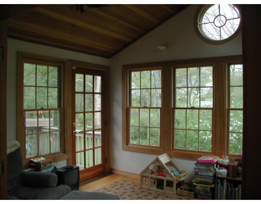 23 Roberts Road Wellesley, MA 02481 - Photo 6 of 7 a living room with furniture and a large window