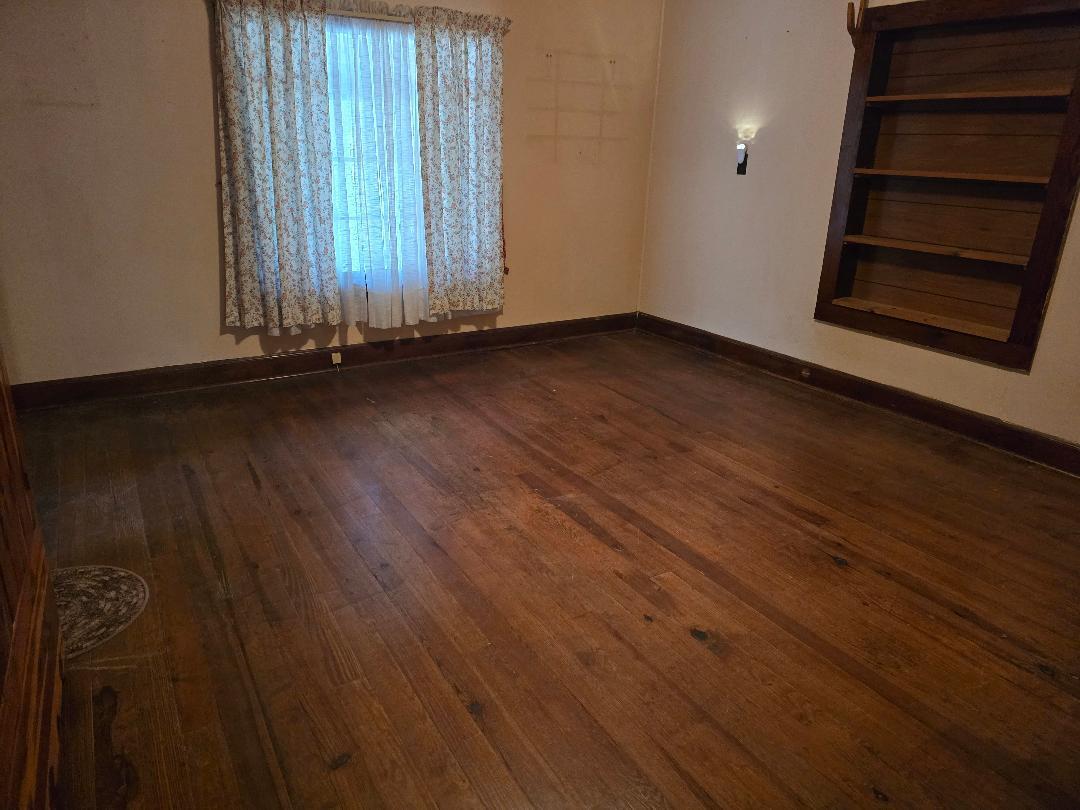 1685 Davis Buchanan, VA 24066 - Photo 5 of 12 an empty room with wooden floor and windows