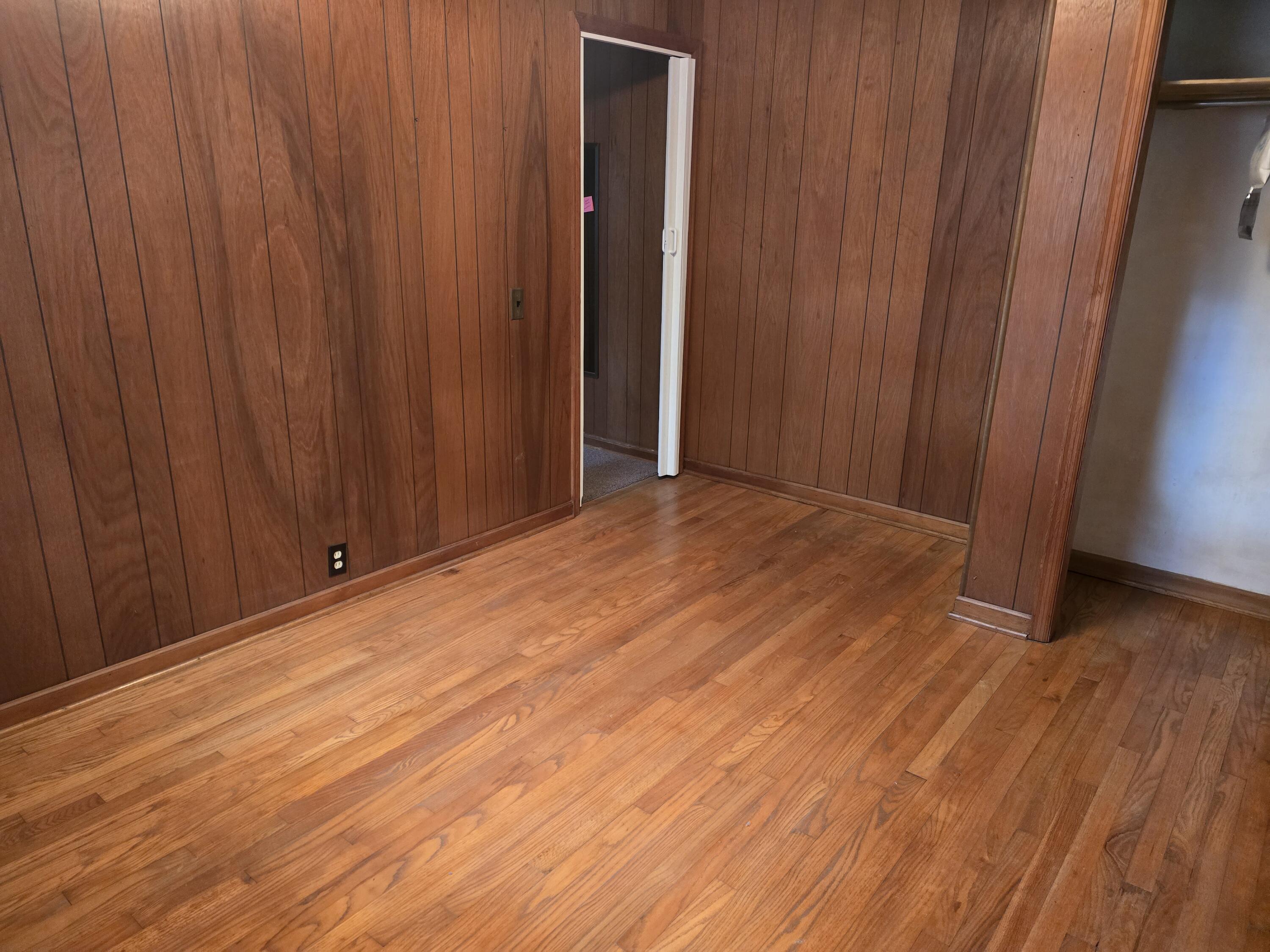 1685 Davis Buchanan, VA 24066 - Photo 6 of 12 a view of an empty room with wooden walls