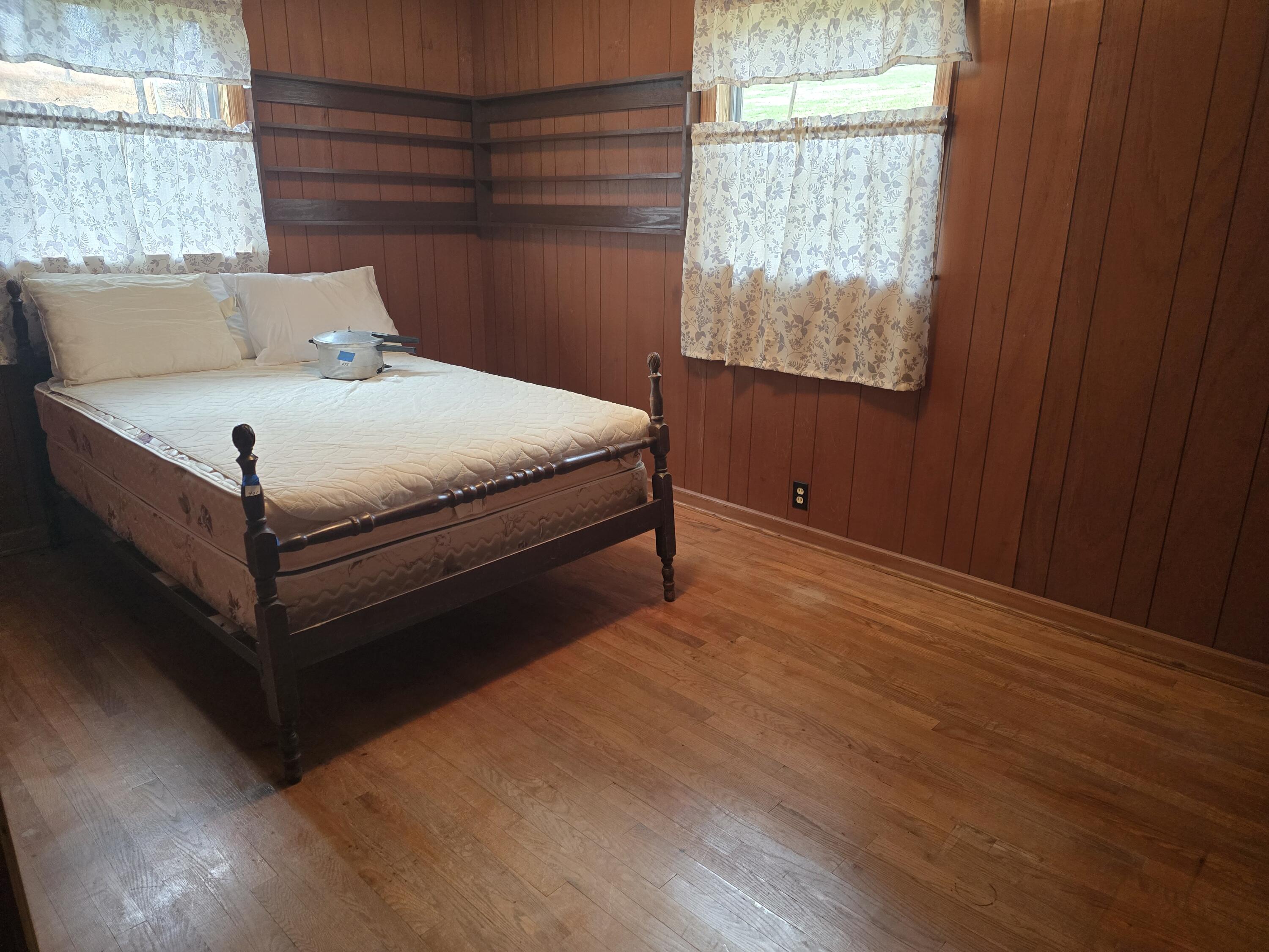 1685 Davis Buchanan, VA 24066 - Photo 7 of 12 a bedroom with a bed and window