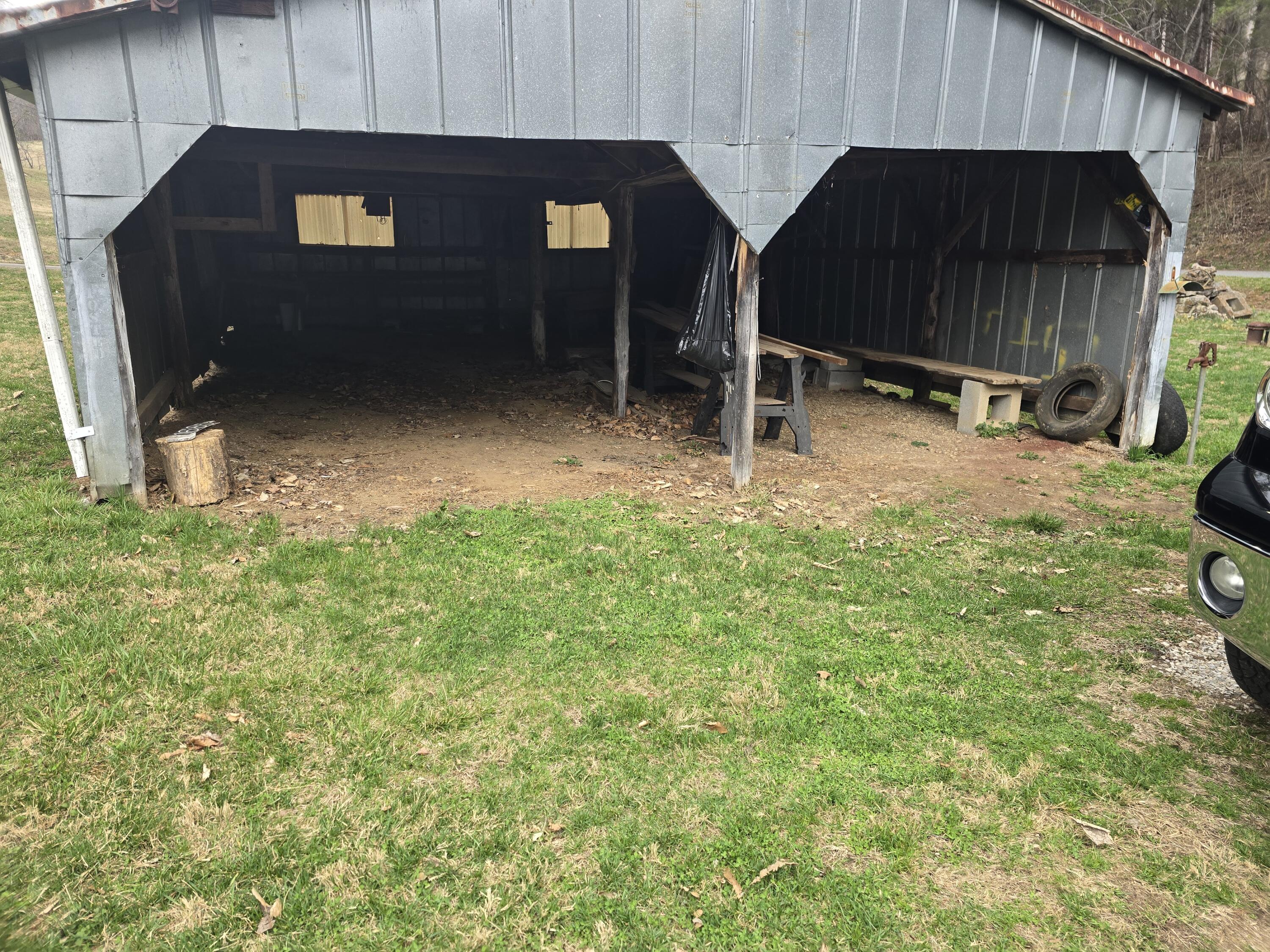 1685 Davis Buchanan, VA 24066 - Photo 10 of 12 a backyard of a house with table and chairs a barbeque
