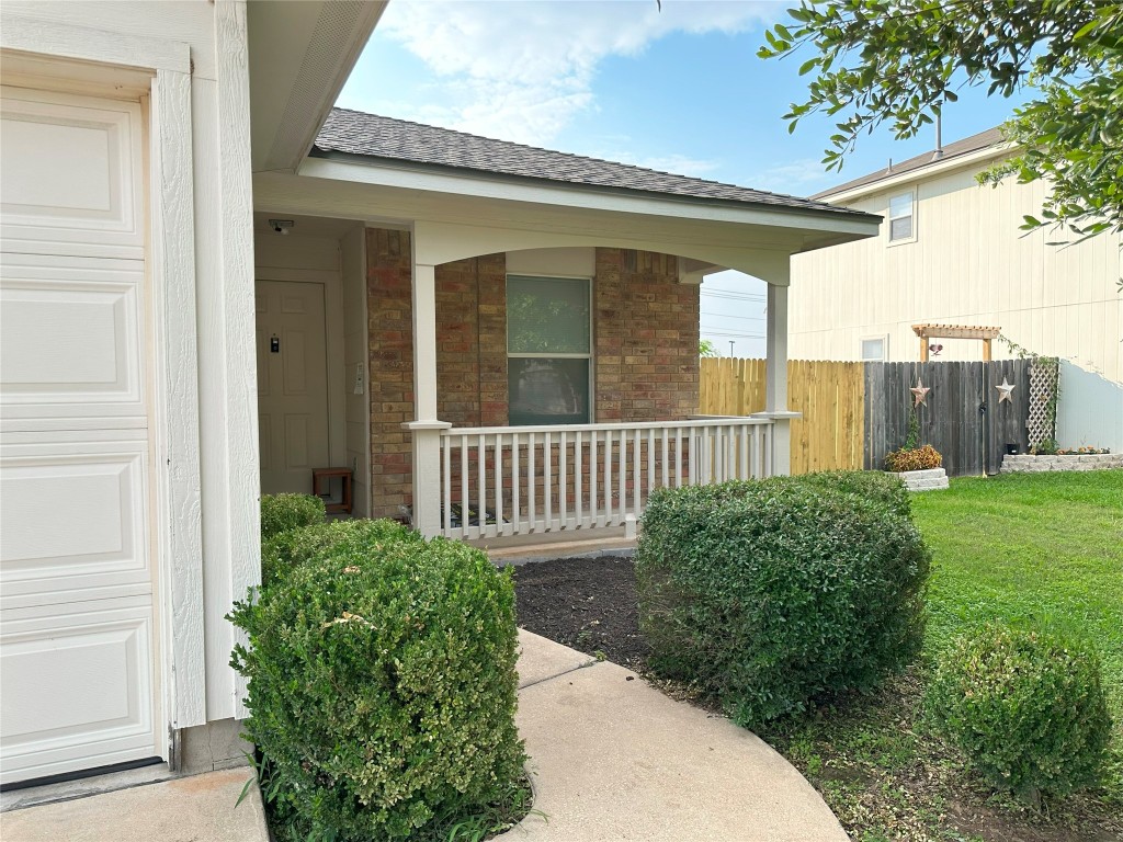 160 Unity Kyle, TX 78640 - Photo 1 of 1 a view of a house with a small yard and a large window