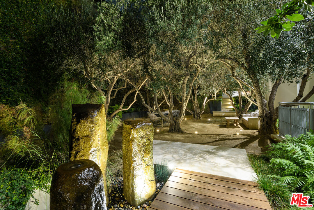 1609 Magnetic Terrace Los Angeles, CA 90069 - Photo 22 of 24 a view of yard along with trees