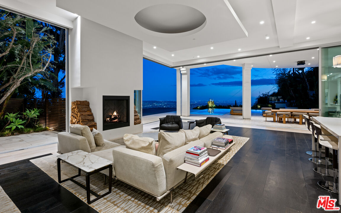 1609 Magnetic Terrace Los Angeles, CA 90069 - Photo 5 of 24 a living room with furniture and a fireplace