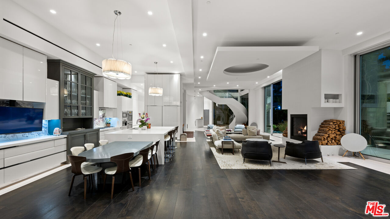 1609 Magnetic Terrace Los Angeles, CA 90069 - Photo 7 of 24 a view of a dining room with furniture window and wooden floor