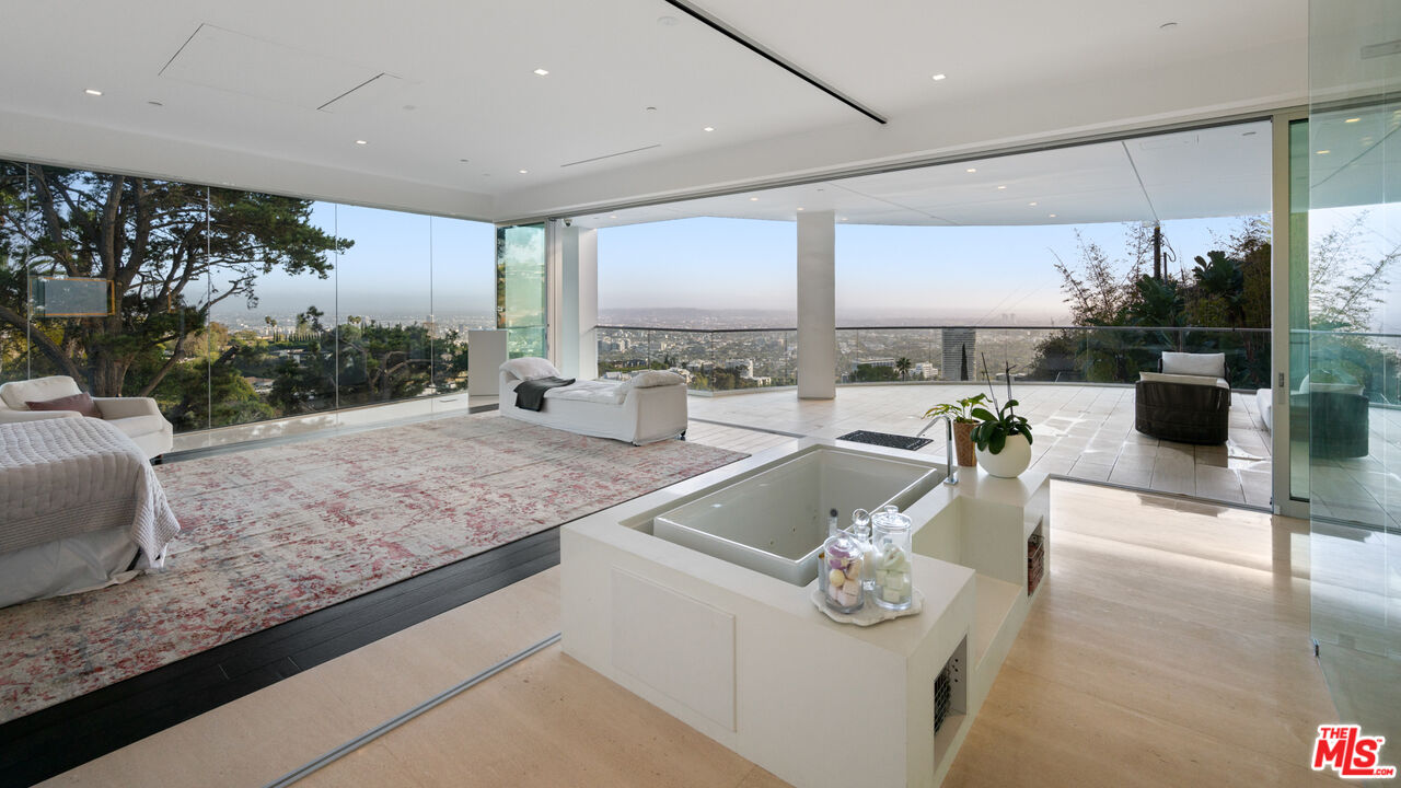 1609 Magnetic Terrace Los Angeles, CA 90069 - Photo 9 of 24 a living room with furniture and a large window