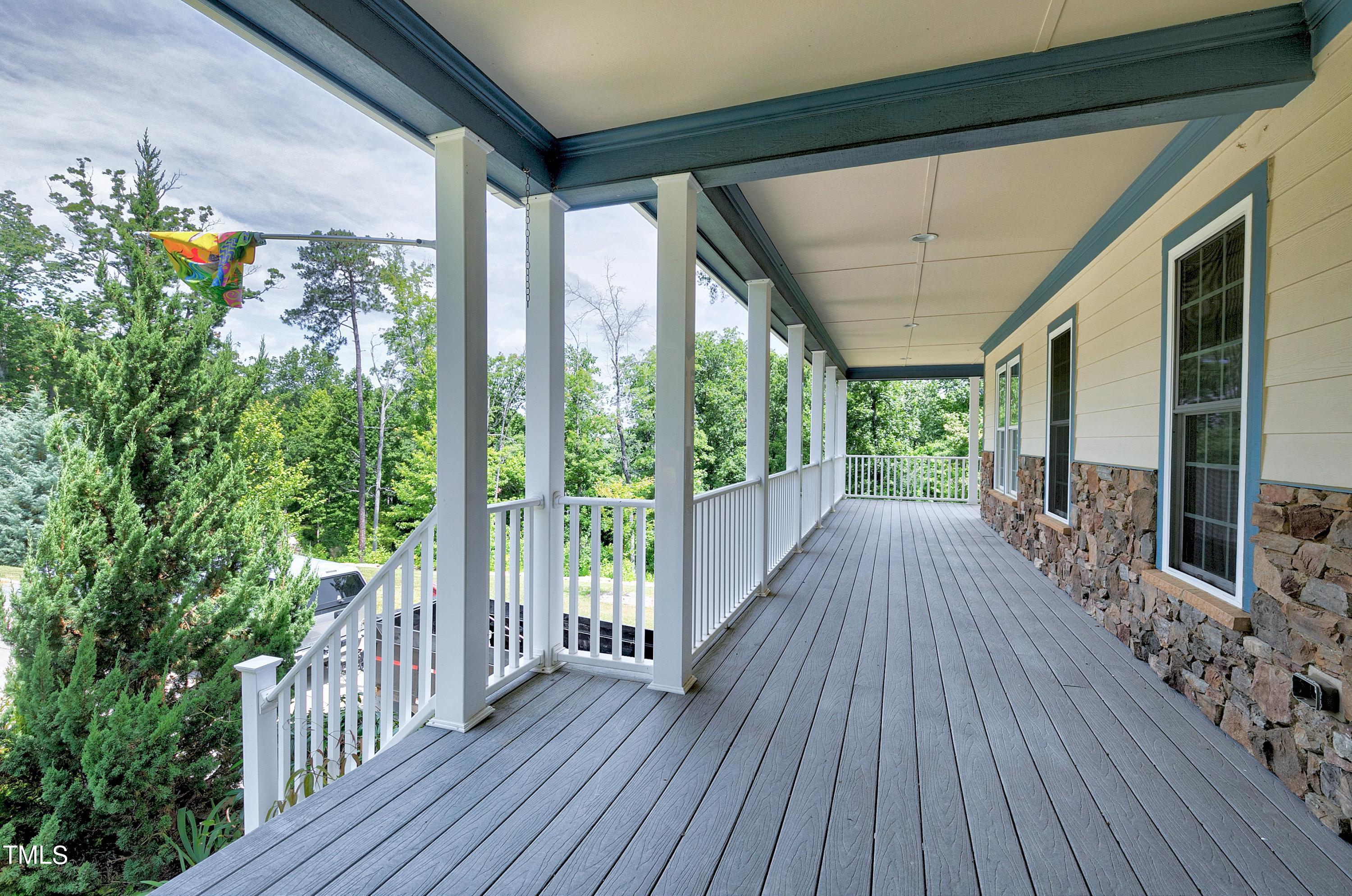 644 Uwharrie Ridge Road Chapel Hill, NC 27516 - Photo 11 of 43 a view of balcony with wooden floor