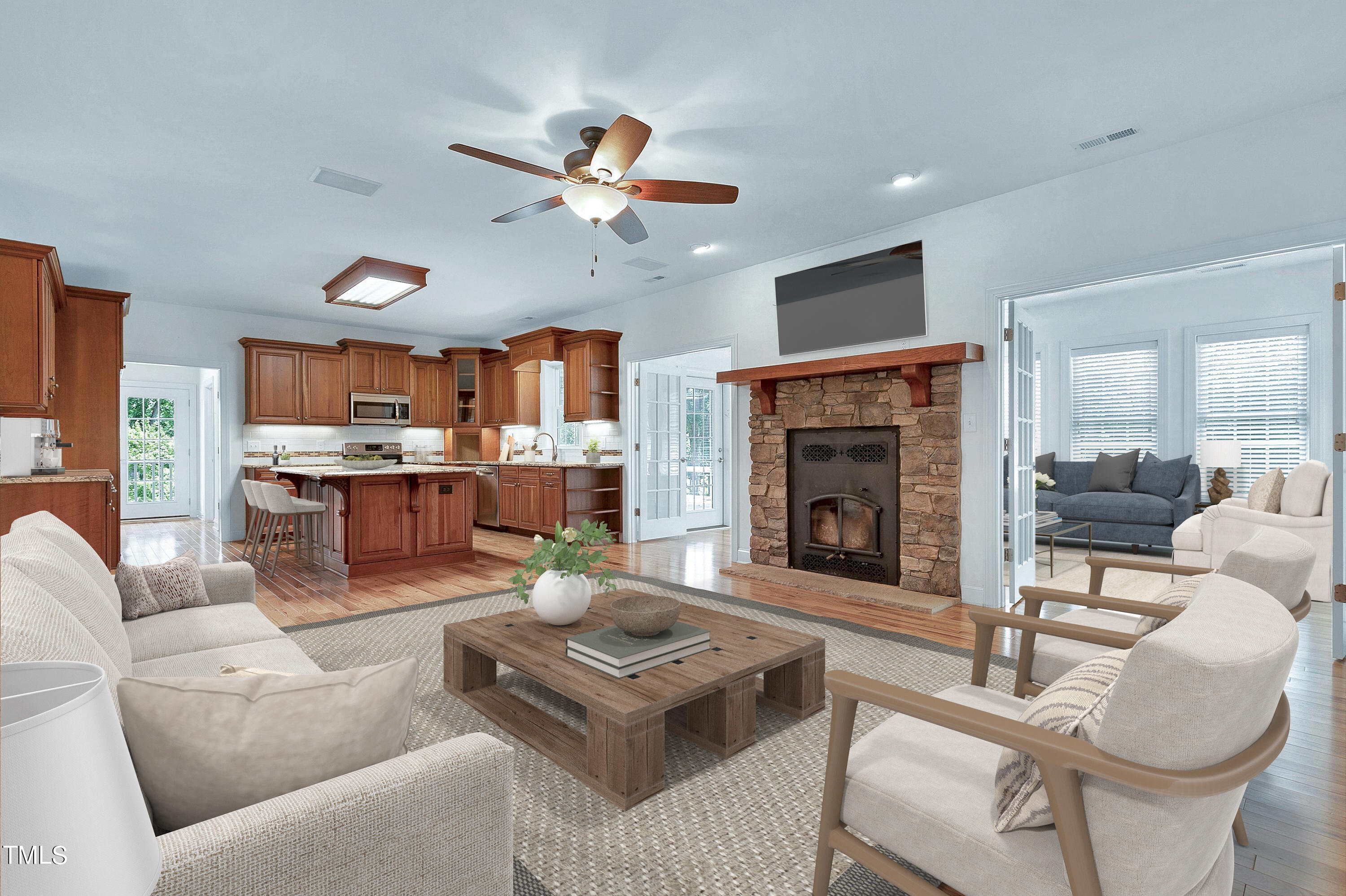 644 Uwharrie Ridge Road Chapel Hill, NC 27516 - Photo 14 of 43 a living room with furniture kitchen view and a fireplace