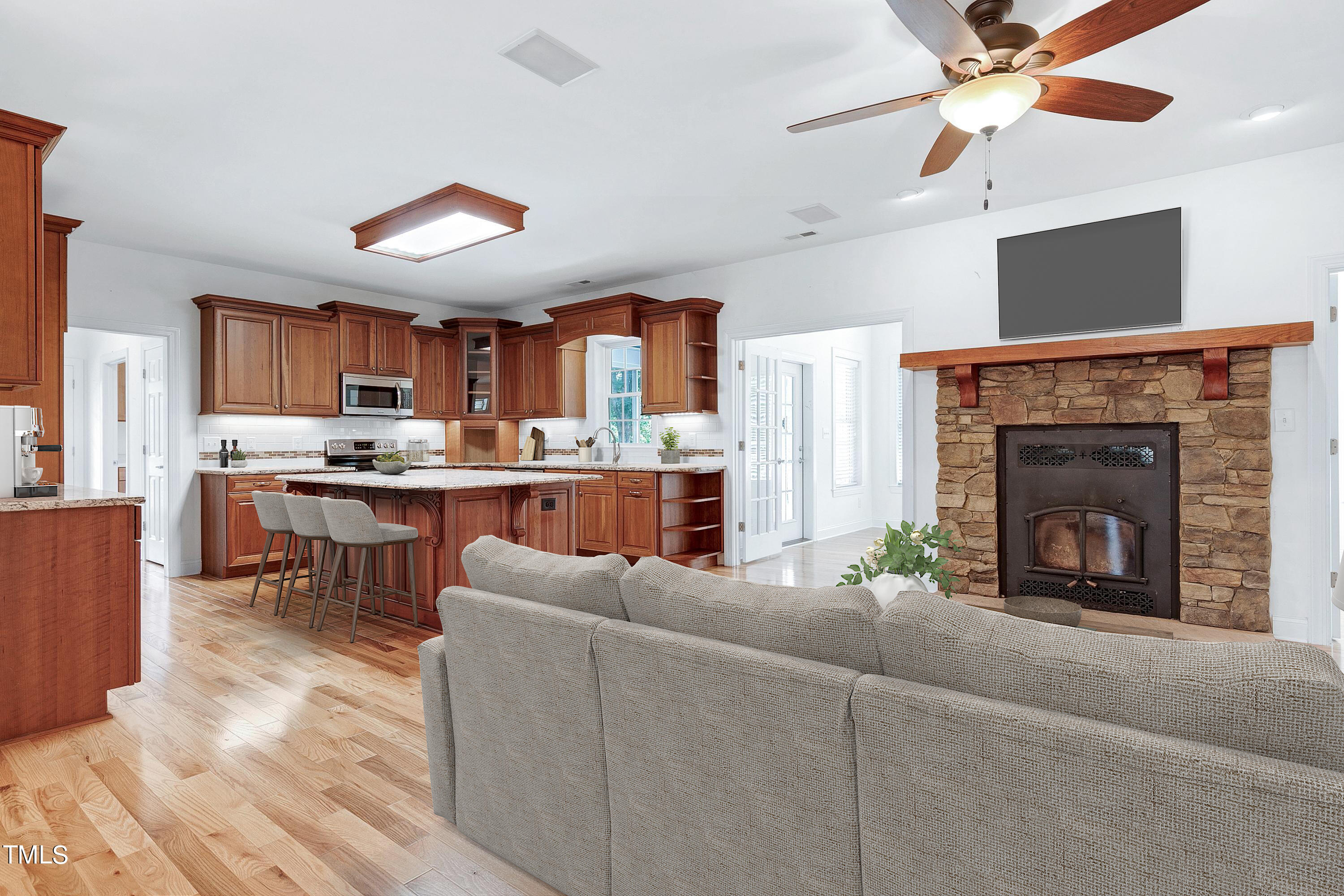 644 Uwharrie Ridge Road Chapel Hill, NC 27516 - Photo 19 of 43 a living room with furniture and a fireplace